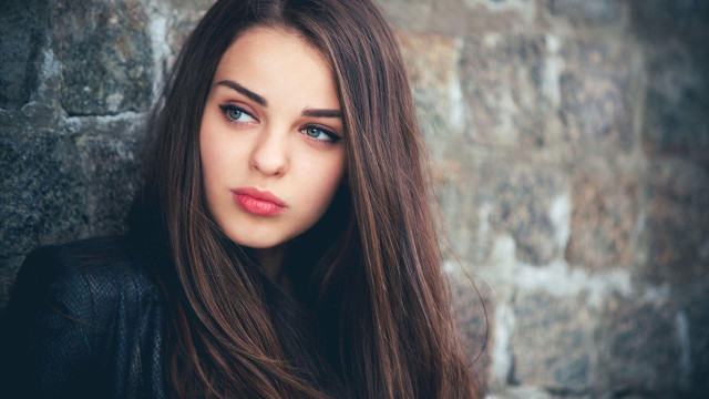 Woman long hair stone wall #2 free wallpaper for desktop - medium preview image