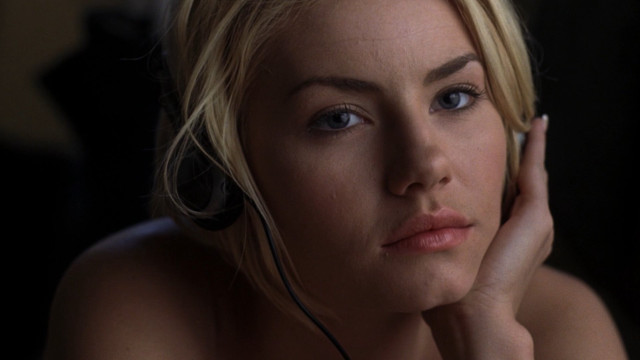 Woman headset serious look camera free wallpaper for desktop - medium preview image