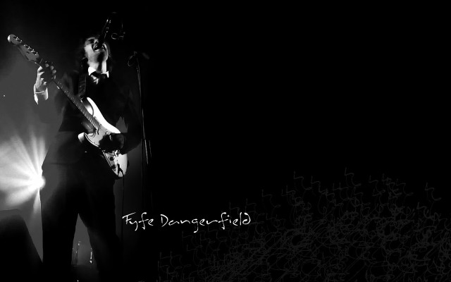 Man playing guitar on stage #7 free wallpaper for desktop - medium preview image