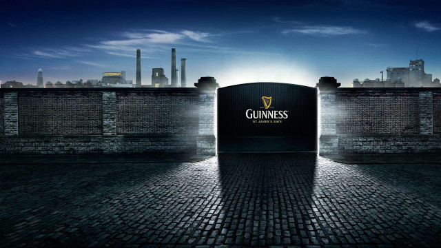 Guinness sign brick wall city free wallpaper for desktop - medium preview image