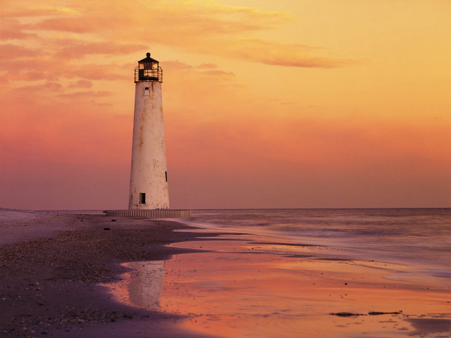 Lighthouse beach sunset pink sky free wallpaper for desktop - medium preview image