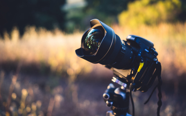 Camera lens tripod field grass free wallpaper for desktop - medium preview image