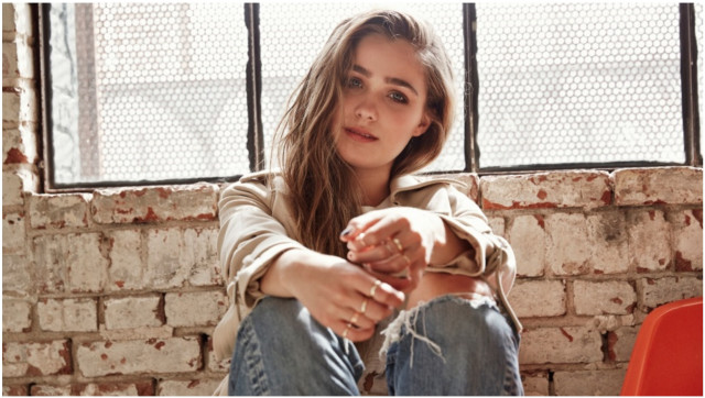 Woman sitting brick wall window free wallpaper for desktop - medium preview image