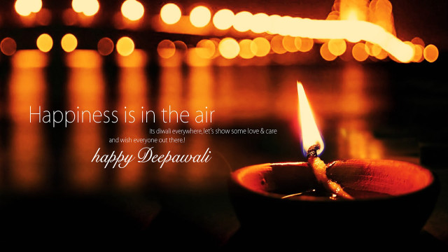 Lit candle happiness quote blurry free wallpaper for desktop - medium preview image