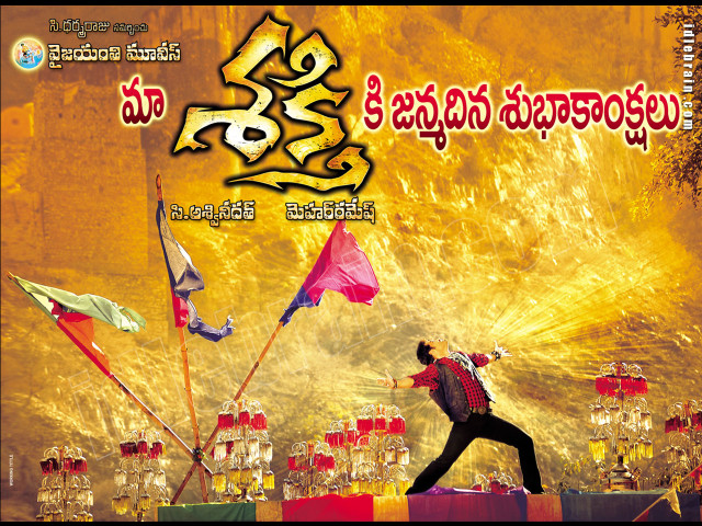 Man flying kite stage yellow free wallpaper for desktop - medium preview image