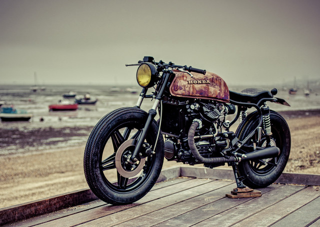 Motorcycle parked wooden platform water #2 free wallpaper for desktop - medium preview image