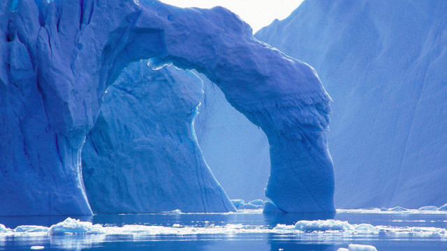 Large iceberg water arch middle free wallpaper for desktop - medium preview image