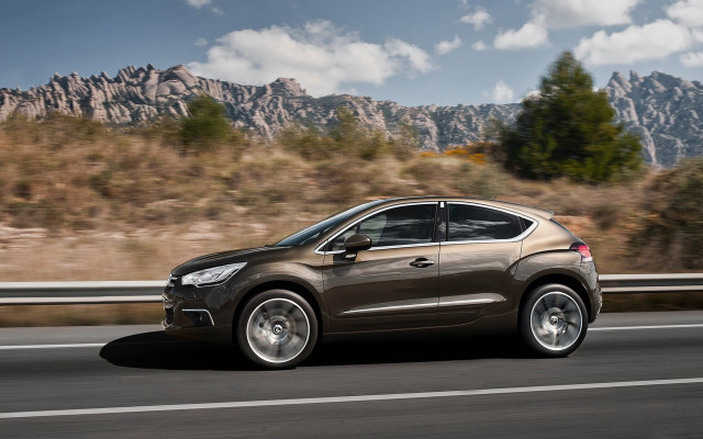 Brown car mountain road forest free wallpaper for desktop - medium preview image