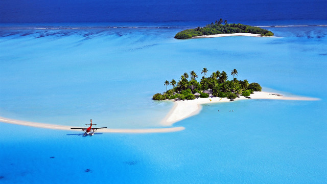 Island person ocean plane flying free wallpaper for desktop - medium preview image