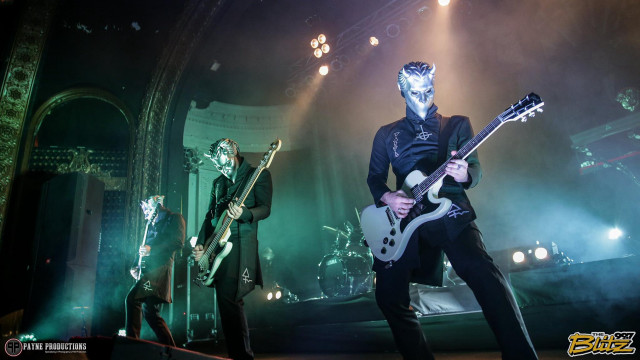 Masked guitarists bodypaint stage performance free wallpaper for desktop - medium preview image