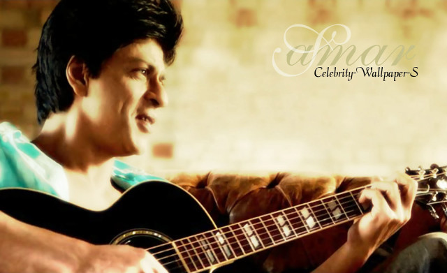 Man couch guitar brick wall free wallpaper for desktop - medium preview image