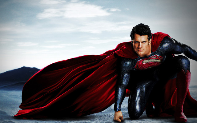 Superman crouching cape open hands free wallpaper for desktop - medium preview image