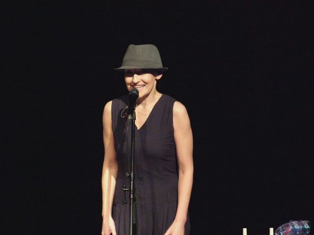 Woman black dress hat stage free wallpaper for desktop - medium preview image