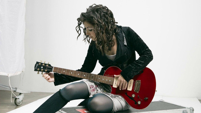 Woman sitting floor red guitar free wallpaper for desktop - medium preview image