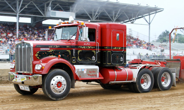 Red semi truck dirt road free wallpaper for desktop - medium preview image