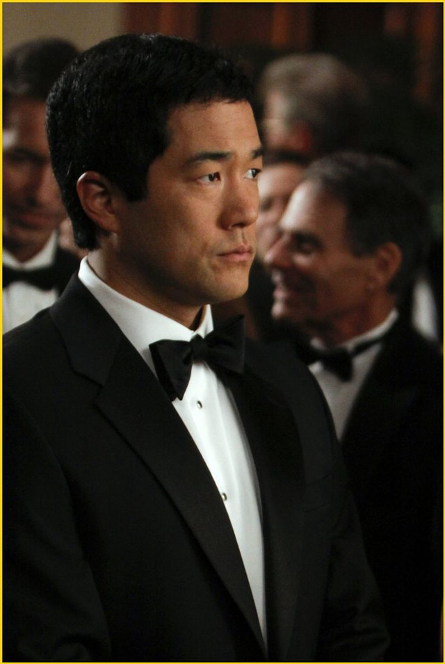 Man tuxedo looking side suits free wallpaper for mobile - medium preview image