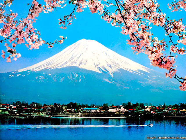 Mountain lake boat flowers sky free wallpaper for desktop - medium preview image