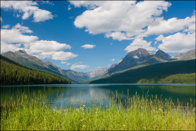 Lake mountains grass blue sky free wallpaper for desktop - medium preview image