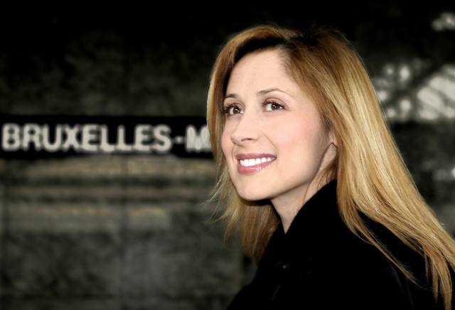 Woman blonde hair standing bruxelles free wallpaper for desktop - medium preview image