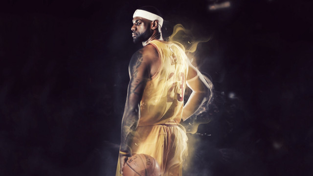 Man yellow uniform holding basketball free wallpaper for desktop - medium preview image