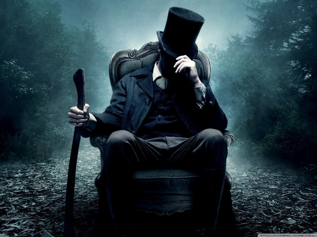 Man top hat coat sitting #3 free wallpaper for desktop - medium preview image