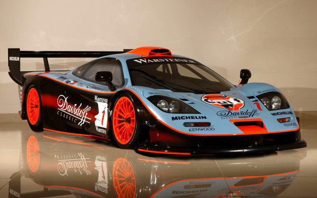 Blue orange race car reflection free wallpaper for desktop - medium preview image