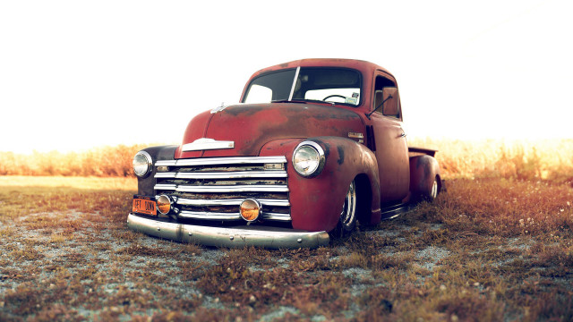 Old red truck field grass #2 free wallpaper for desktop - medium preview image