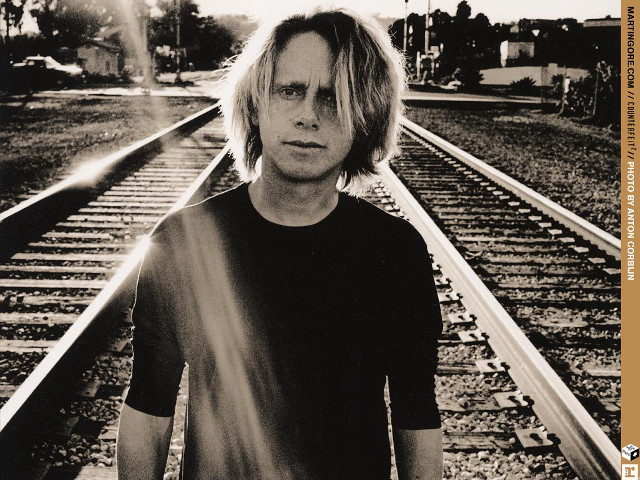 Man standing train track arms free wallpaper for desktop - medium preview image