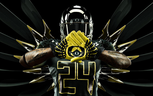Football player yellow black uniform free wallpaper for desktop - medium preview image