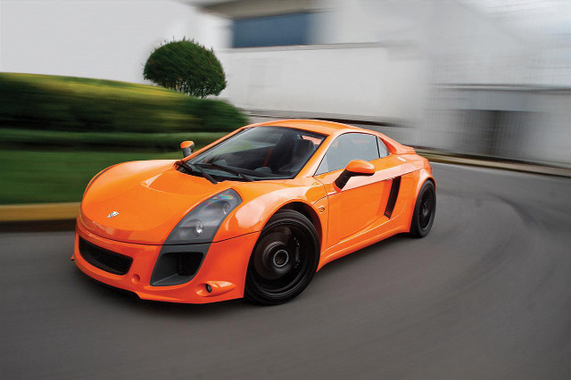 Bright orange sports car blurry #2 free wallpaper for desktop - medium preview image