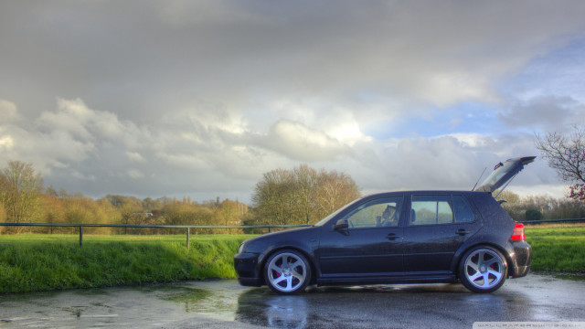 Car parked cloudy sky grass free wallpaper for desktop - medium preview image