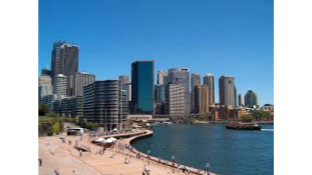 City skyline river boat people free wallpaper for desktop - medium preview image