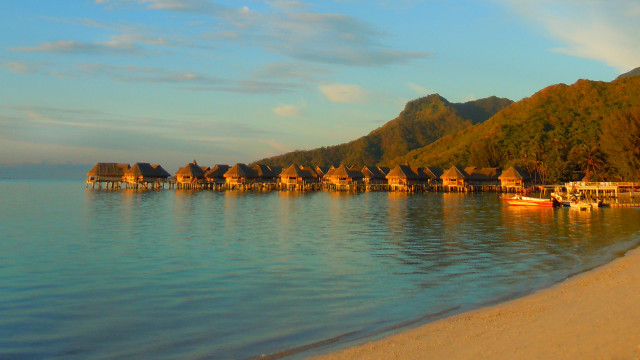 Beach houses boat water mountains free wallpaper for desktop - medium preview image