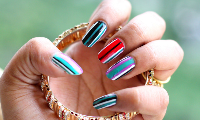 Woman holding ring multicolored nails free wallpaper for desktop - medium preview image