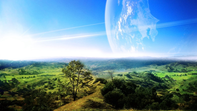 Green landscape blue sky distant free wallpaper for desktop - medium preview image