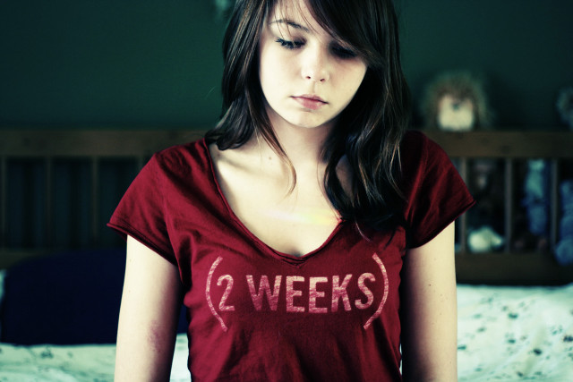 Woman red shirt bedroom bed free wallpaper for desktop - medium preview image