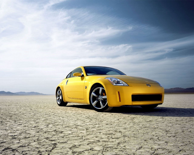 Yellow sports car desert sky free wallpaper for desktop - medium preview image
