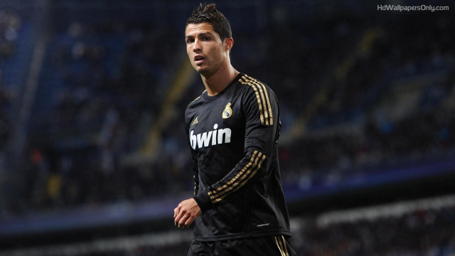 Man black uniform playing soccer free wallpaper for desktop - medium preview image