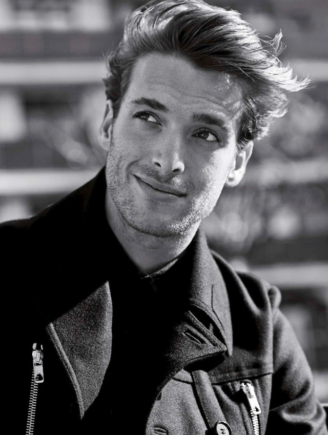 Man jacket smiling camera building free wallpaper for mobile - medium preview image