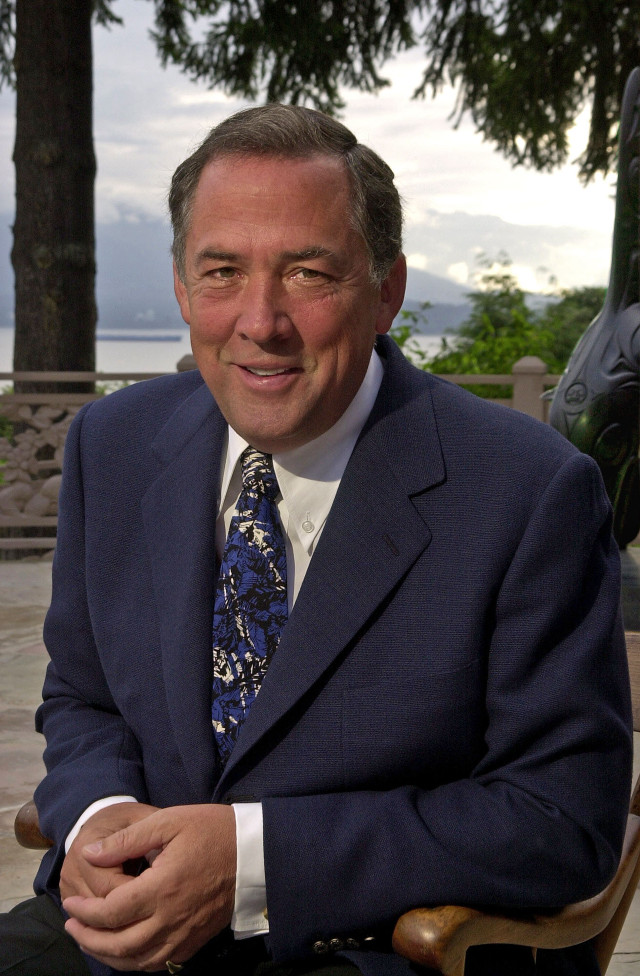 Man suit tie sitting chair #2 free wallpaper for mobile - medium preview image