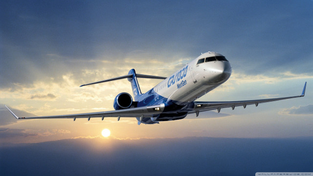Jetliner cloudy sky sun distance free wallpaper for desktop - medium preview image