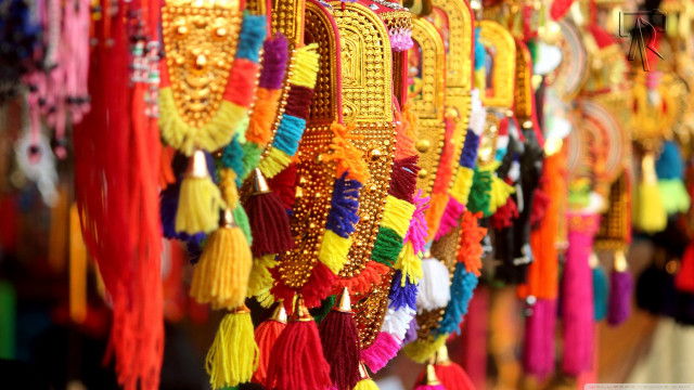 Colorful tassels hanging wall storefront free wallpaper for desktop - medium preview image