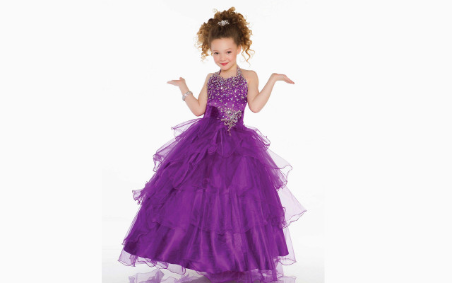 Young girl purple dress posing free wallpaper for desktop - medium preview image
