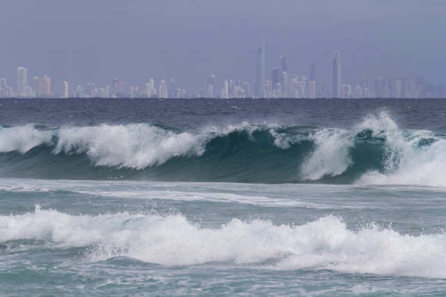 Large wave city skyline ocean free wallpaper for desktop - medium preview image