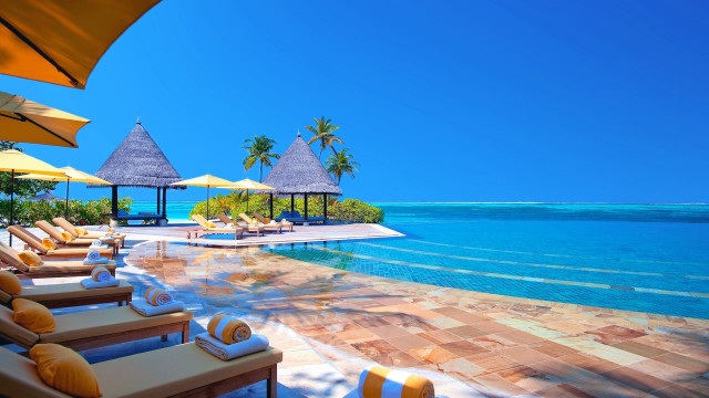 Resort pool lounge chairs umbrellas #2 free wallpaper for desktop - medium preview image