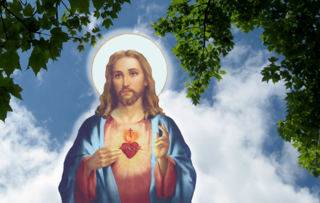 Jesus holding heart sky clouds free wallpaper for desktop - medium preview image