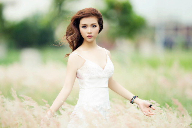 Woman white dress field tall #2 free wallpaper for desktop - medium preview image