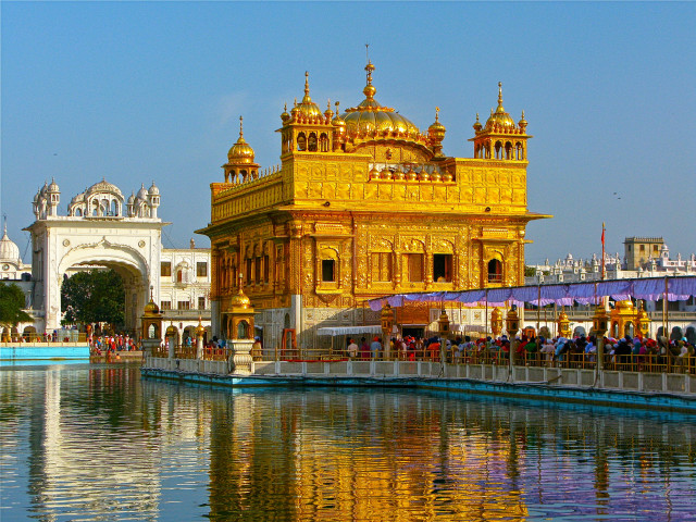 Golden building water people bridge free wallpaper for desktop - medium preview image