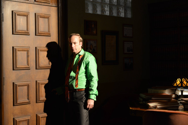 Man standing door green shirt free wallpaper for desktop - medium preview image