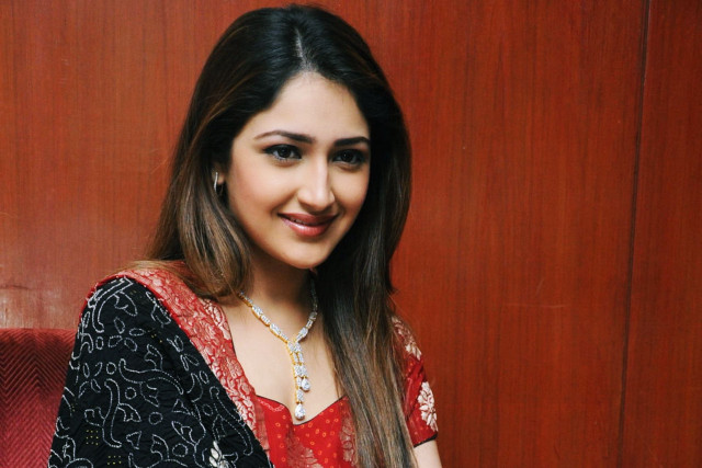 Woman red black sari smiling free wallpaper for desktop - medium preview image